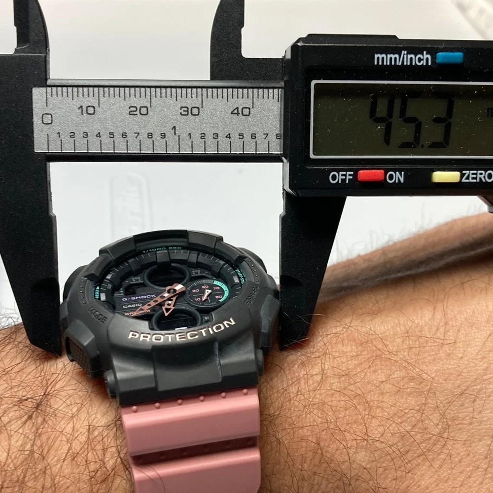 Casio Gshock, GMA-S140, gray bezel, dusty pink strap and accents working battery